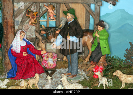 Bavarian sculptured Christmas nativity scene made in Oberammergau School dressed in real clothing Bavaria Germany Europe Stock Photo