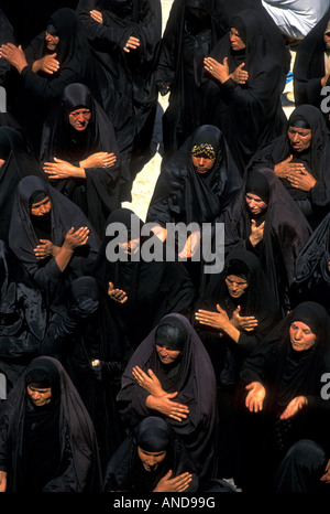 Shiites women mourning in imam Husein's mosque Karbala Iraq. Stock Photo