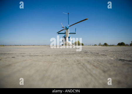 helicopter taking off from the landing track, rear view Stock Photo
