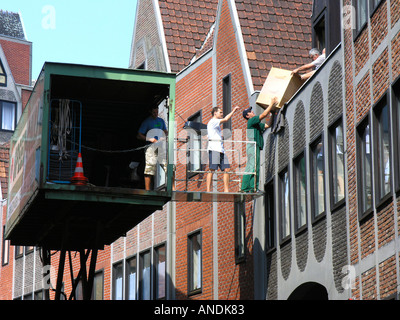 Moving crane for moving furniture from above Stock Photo