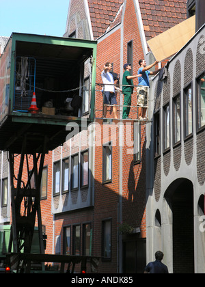 Moving crane for moving furniture from above Stock Photo