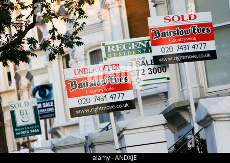 For Sale Under Offer and Sold signs West Hampstead London UK Stock Photo