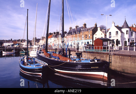 Fifie type fishing vessel Reaper tied up in Anstruther Harbour Stock Photo