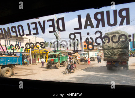 Mynamar Burma Southern Shan State Augban traffic on the main street viewed through the windscreen of a car driving Stock Photo