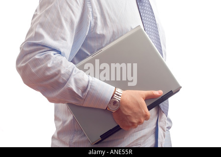 Businessman holding a laptop computer Stock Photo