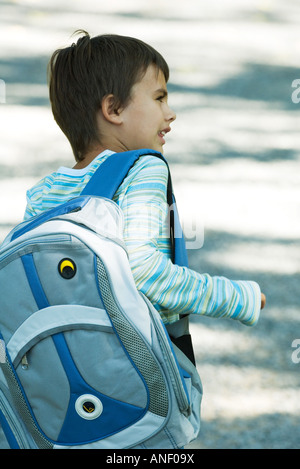 Boy wearing backpack, rear view Stock Photo