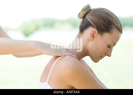 Woman receiving shoulder massage Stock Photo