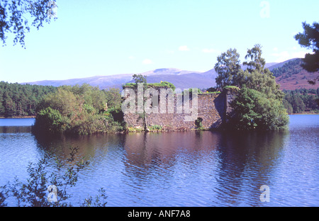 A fine summer view of the castle ruin in Loch an Eilein near Aviemore in Scotland Stock Photo