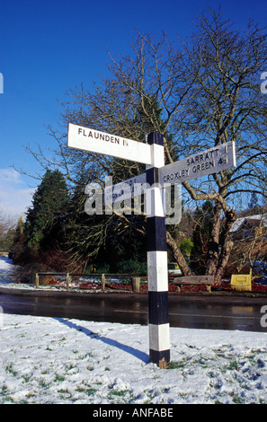 Signpost Outside The Plough Public House, Belsize, Hertfordshire Stock Photo