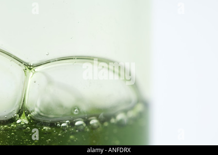Bubbles in green gel, extreme close-up Stock Photo
