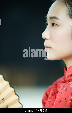 Young woman wearing traditional Chinese clothing, profile Stock Photo
