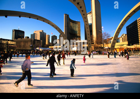 Skaters, Nathan Phillips Square in winter, Toronto, Ontario, Canada Stock Photo