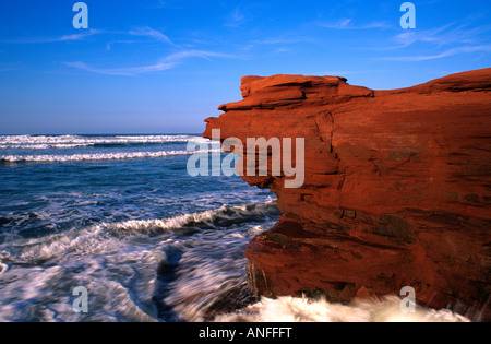 Surf and sandstone cliffs, Cavendish Beach, PEI National Park, Prince Edward Island, Canada Stock Photo