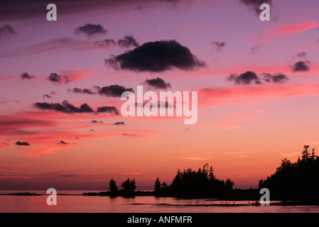 The sun sets Lake Huron in Fathom Five National Marine Park, Tobermory, Ontario, Canada. Stock Photo