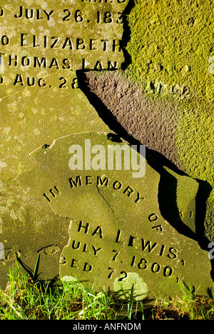 St Johns Church Batheaston Bath BaNES England UK A broken memorial stone in the graveyard Stock Photo