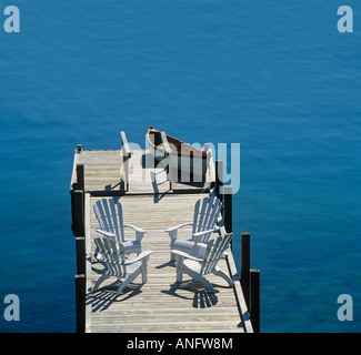 Dock with dory and lawn chairs, Chester, Nova Scotia, Canada. Stock Photo
