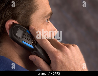 Close up of a man on his cell phone Stock Photo