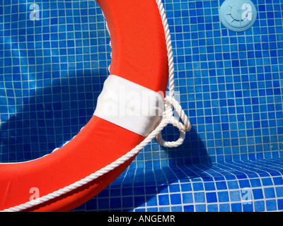 life aid floating in pool, Photo by Willy Matheisl Stock Photo