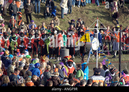 The arrival of Sinterklaas where he is being met by a crowd of kids and their parents Stock Photo
