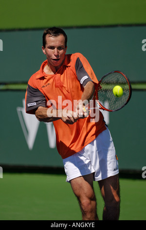 Czech tennis star Radek Stepanek returns a backhand to Xavier Malisse at the 2006 Indian Wells Pacific Life open Stock Photo