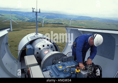 Engineer check gearbox of turbine at Carno Windfarm in Wales Stock Photo