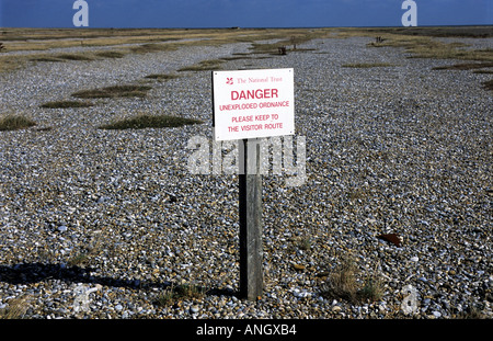 'Danger Unexploded Ordinance' sign on Orfordness, Suffolk, UK. Stock Photo