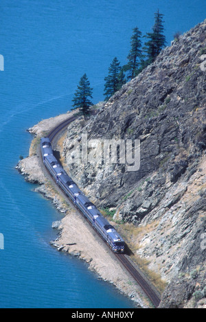 The Prospector, BC Rail passenger train travels along Seton Lake, British Columbia, Canada. Stock Photo