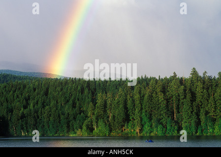 Rainbow spans across Dutch Lake, Clearwater, British Columbia, Canada. Stock Photo