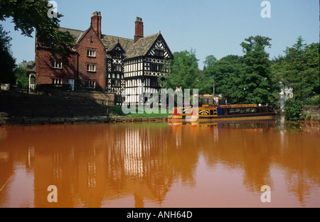 Bridgewater canal Worsley Lancashire North West England UK Europe colour due to Iron oxide leaching out of old mine workings Stock Photo