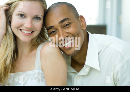 Couple smiling at camera, portrait Stock Photo