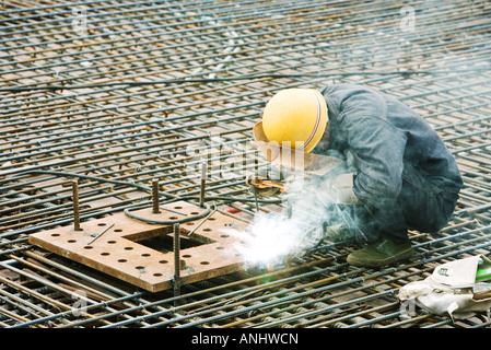 Construction worker working at construction site Stock Photo