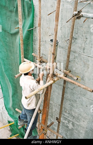 Construction worker working at construction site Stock Photo