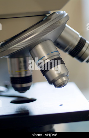 Science scientific glass wear research medical biology chemistry cancer fluid lab laboratory bench work lens microscope magnific Stock Photo