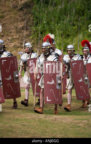 Roman soldiers in formation with shields and weaponry at a Roman army ...