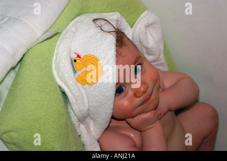 Happy baby takes a bath and laughs Model released and Property released Image youth youthful young one ones America Americana Am Stock Photo