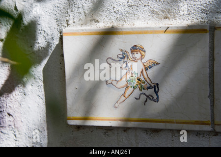 Marbella Malaga Province Costa del Sol Spain Ceramic tile with angel on wall in old town Stock Photo