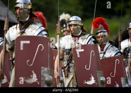 Roman Soldiers Marching With Shields And Weaponry At A Roman Army 