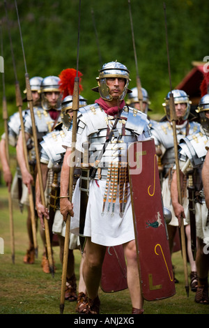 Roman soldiers marching with shields and weaponry at a Roman army ...