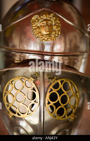 A replica of Roman age Gladiators helmet at an historical reenactment, Chedwoth Villa, Gloucestershire, UK Stock Photo