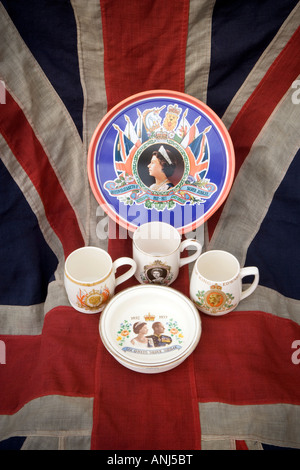 Vintage Commemorative Mugs, china bowl and a biscuit tin depicting Royal events Stock Photo