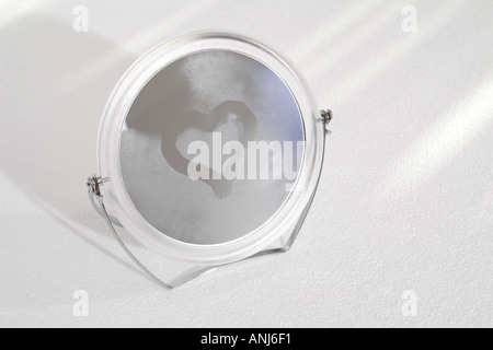 round mirror steamed Stock Photo