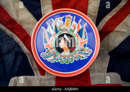 Vintage biscuit tin shot against the Union Jack flag Stock Photo