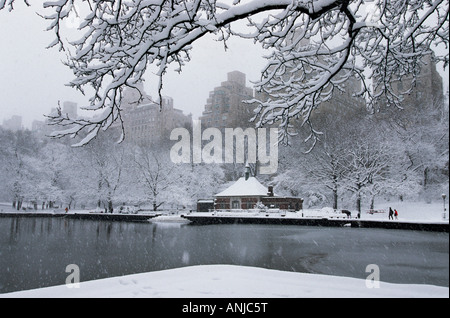 New York City Central Park snow scene. The Boat Pond Conservatory Water Boathouse. Boat Basin. New York winter landscape USA Stock Photo