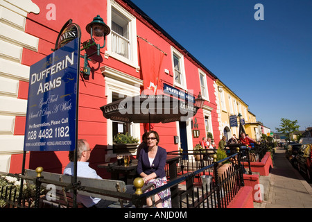 UK Northern Ireland County Down Killyleagh High Street Dufferin Arms bar people sat outside in sunshine Stock Photo