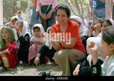 Najma Omar Olomi The School Founder Surrounded By Some Of The Students Kabul Afghanistan Stock Photo
