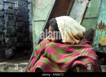 Woman wrapped in shawl in Delhi India Stock Photo