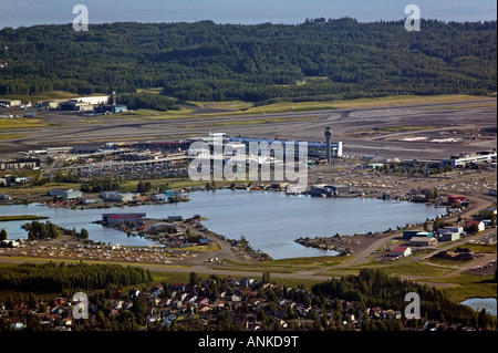 aerial above Ted Stevens Anchorage International airport (ANC) and Lake Hood seaplane base Alaska Stock Photo