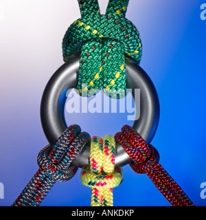 Multi-colored ropes tied around a metal ring