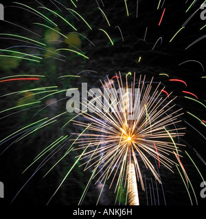 Firework burst-off high at the night sky Stock Photo