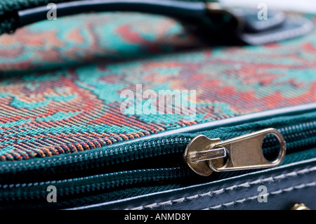 Zipper on hand luggage Stock Photo